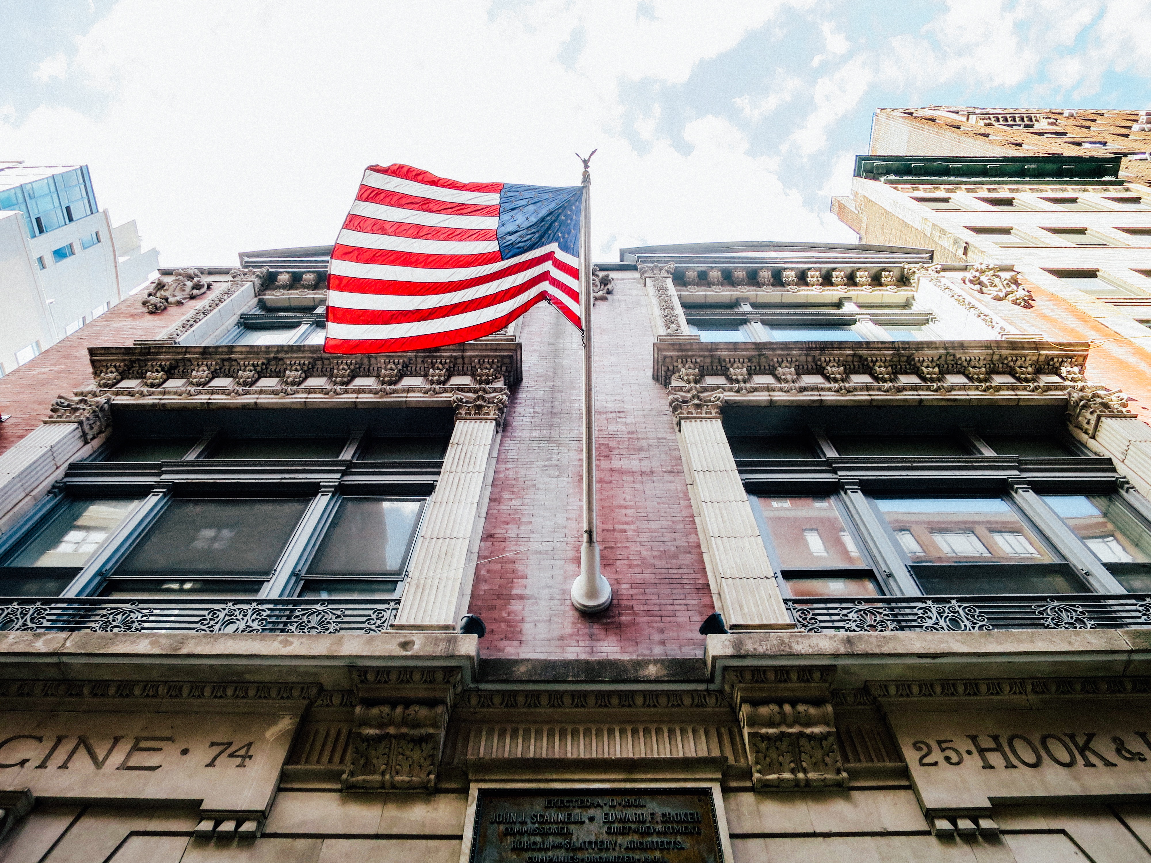 A picture of a building with American flag